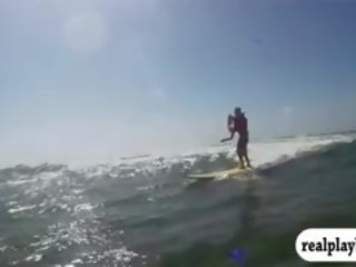 Group of inviting badass girls tryout surfing and jetski naked