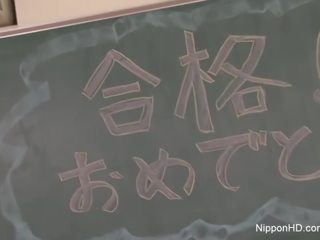 Sexually aroused Japanese teacher fucks herself in a classroom