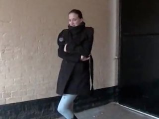 Lascivious lassie pisses in leggings and vids her tits in public