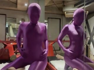 Mademoiselle in Purple Zentai gives him Handhob to cum dirty film clips